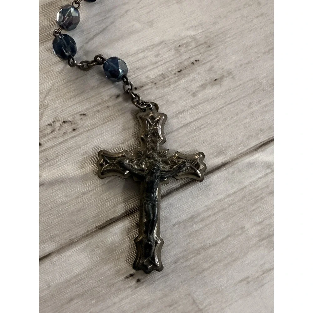A vintage blue glass bead rosary with a silver-toned metal crucifix and medal. - Picture 2 of 10